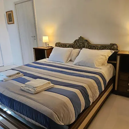 Agnello - Arte Грандола-ед-Унити